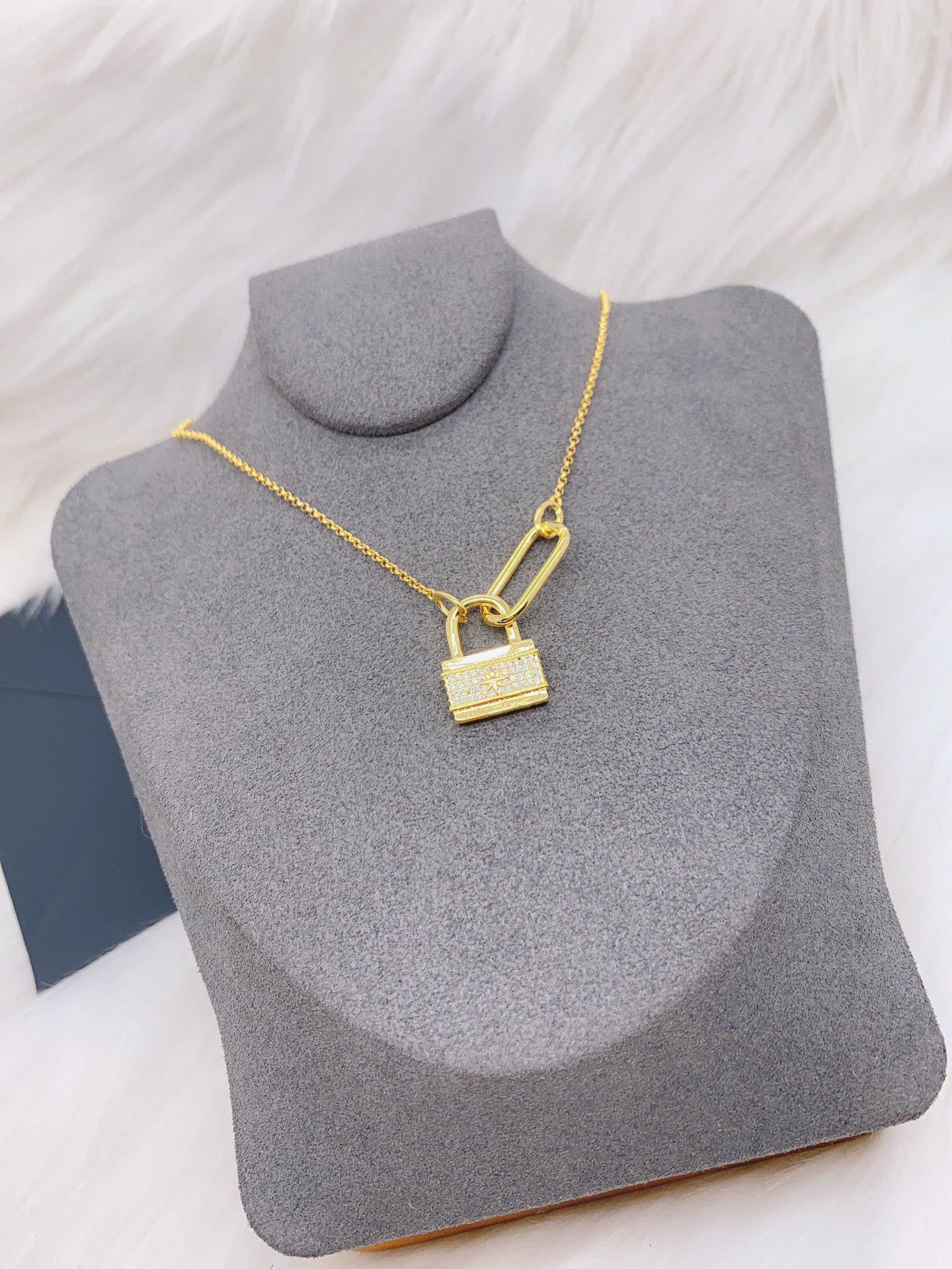 APM Monaco Gold Lock Pendant Necklace